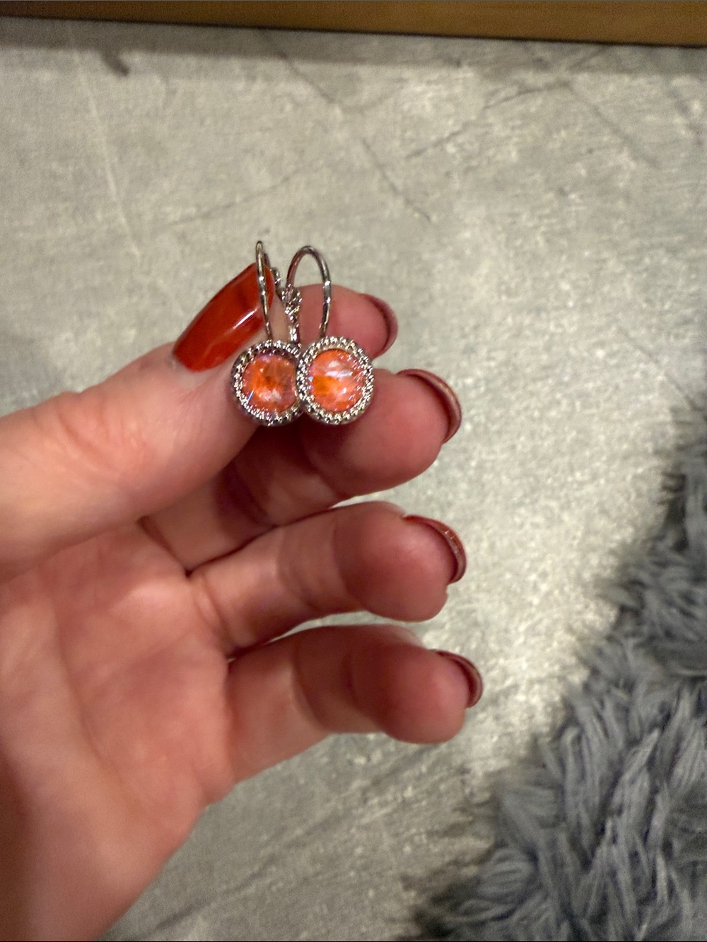 Touchstone Crystal Silver Drop Earrings with Orange Crystal Centers